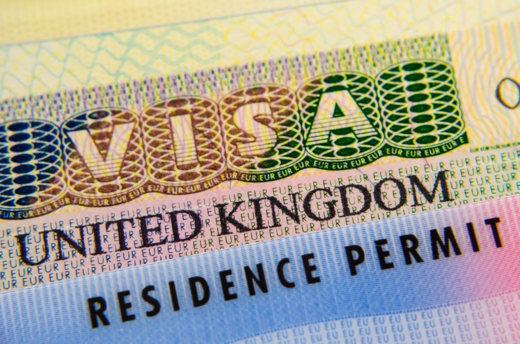 How do I get a UK Residence Card to stay permanently in the United kingdom?